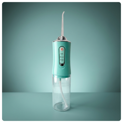 colour:green Green Avelora Pro water flosser on a teal background