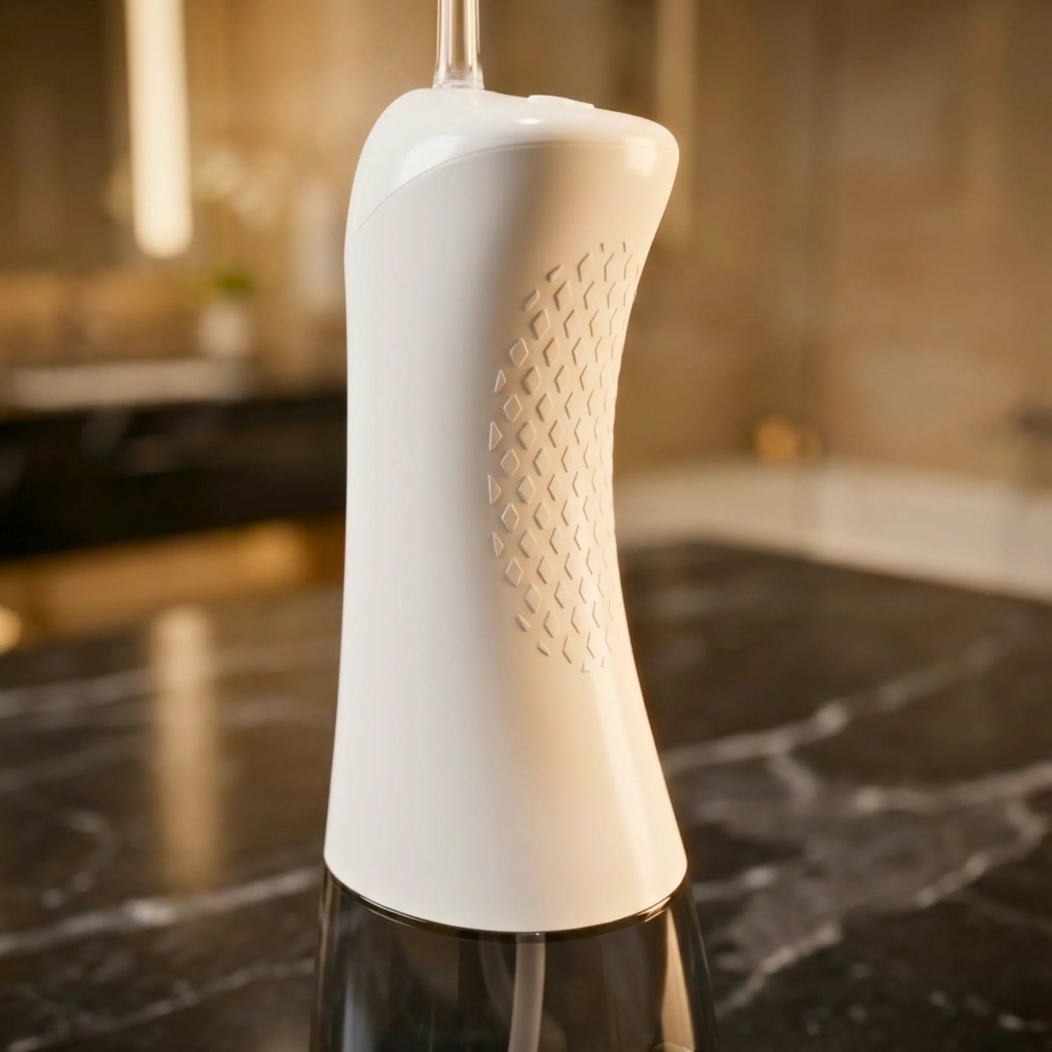 White Avelora Apex water flosser close up of anti-slip grip and ergonomic swan neck arc design.