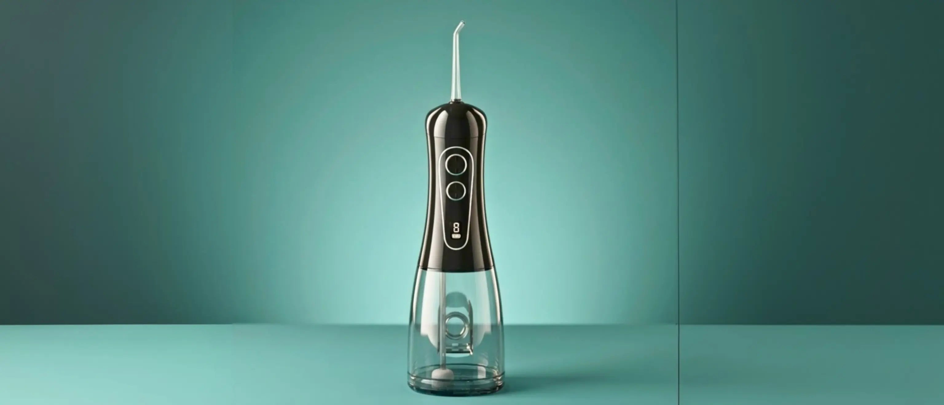 Black Avelora Apex water flosser front profile on a teal background with studio lighting.